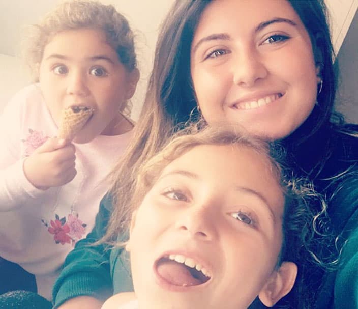 Au pair and host children.
